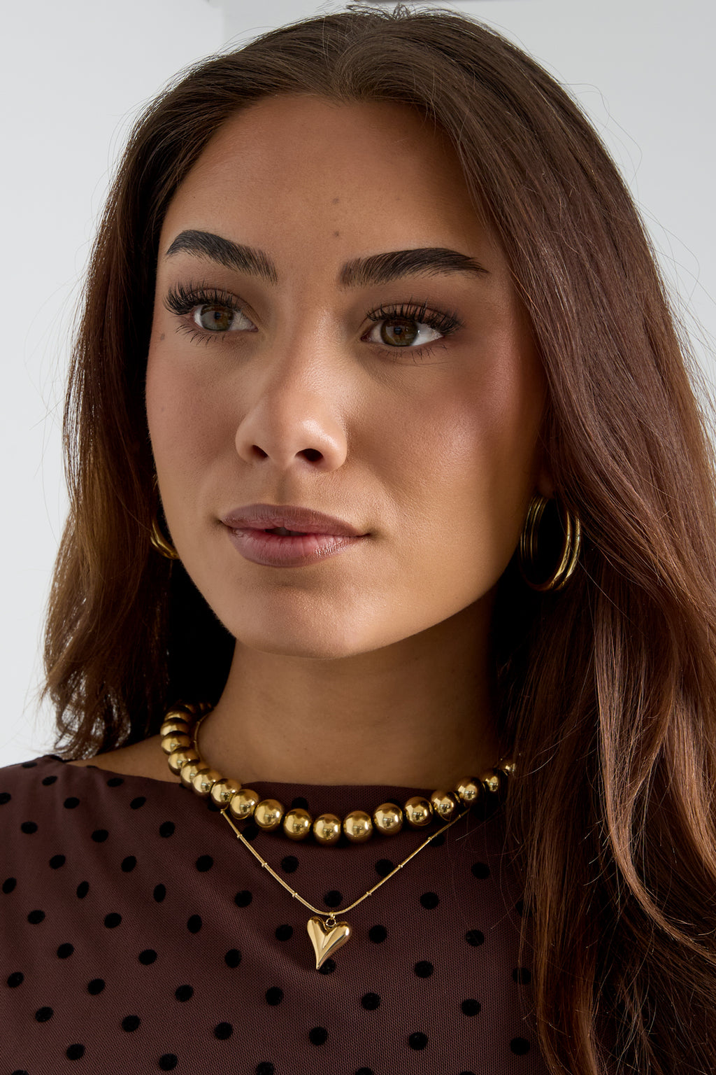 Collana a sfera con iconico cuore medio