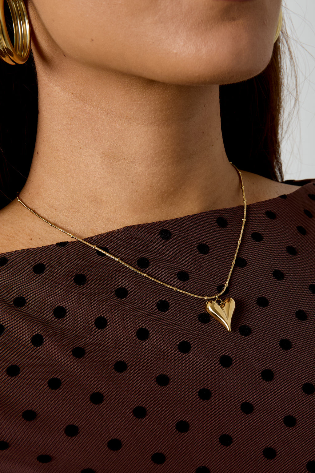 Collana a sfera con iconico cuore medio
