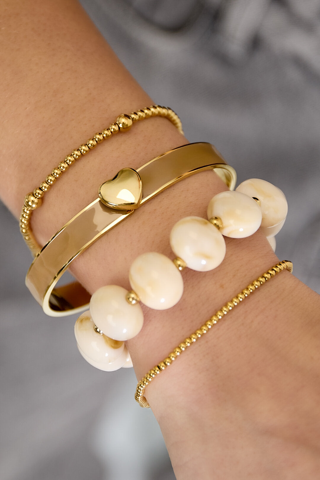 Bracciale in vari colori con dettaglio cuore - 0,9 cm